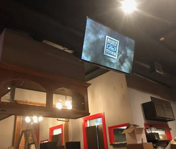 Experience an immersive entertainment setup with flat-screen TV mounting.
