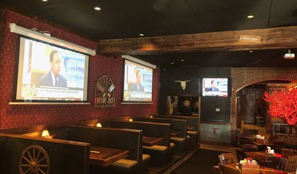 Secure ceiling TV mounting service ensures optimal viewing angles and stability.